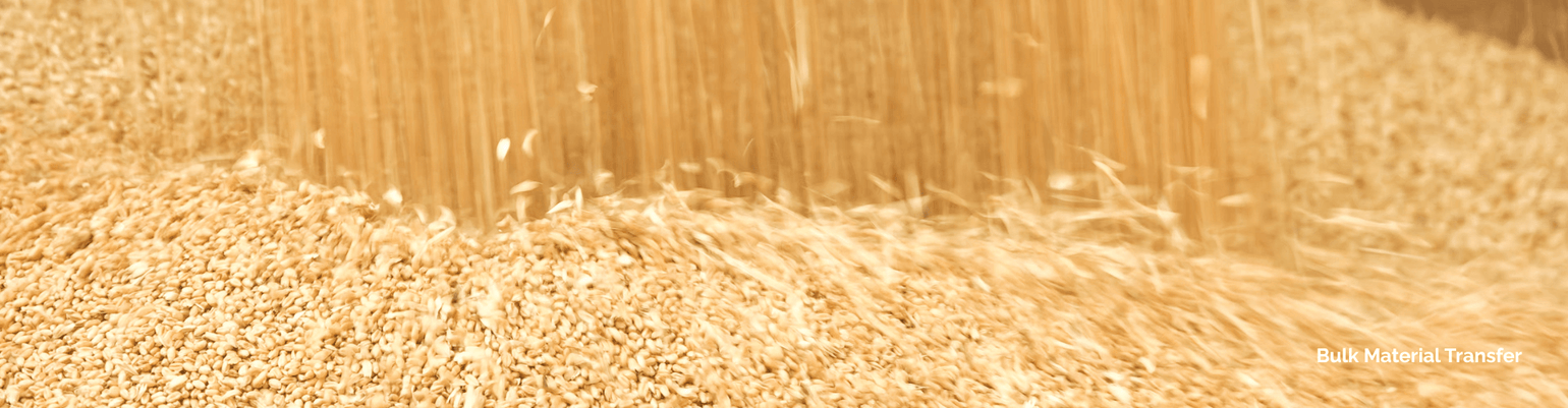 Bulk material transfer of grains showcasing abrasion-resistant hoses for industrial and agricultural use.