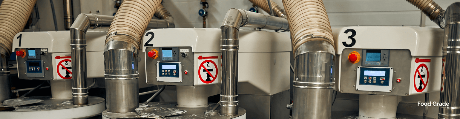 Food grade hose systems with FDA-compliant machinery for powder transport in food production environments.