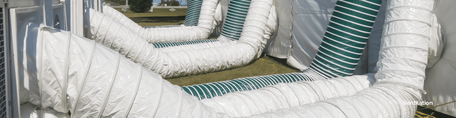 White and green ventilation hoses optimized for airflow in enclosed spaces, showcasing their flexible design and heat tolerance.