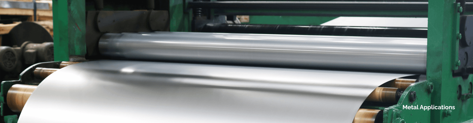 Industrial metal applications showing a rolling mill processing aluminum sheets for harsh environments.
