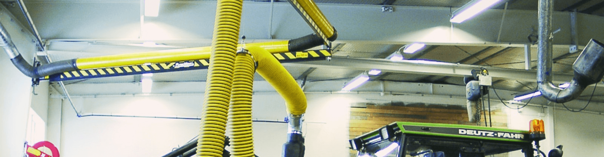 Durable exhaust system for tractor pull competition, featuring high-velocity pipes and heat-resistant materials.