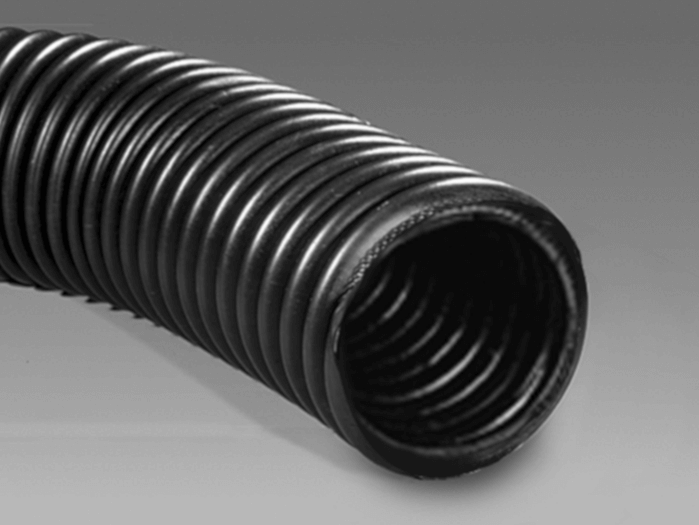 Close-up of a durable black rubber hose, highlighting its ribbed design for strength and flexibility in industrial applications.