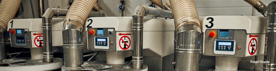 Food grade hose systems with FDA-compliant machinery for powder transport in food production environments.