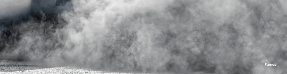 Thick cloud of fumes rising, illustrating the importance of effective fume ventilation in industrial settings.