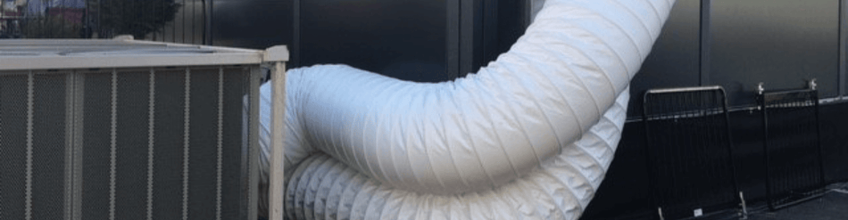 White flexible ducting connected to a dehumidifier for effective humidity control in controlled environments.