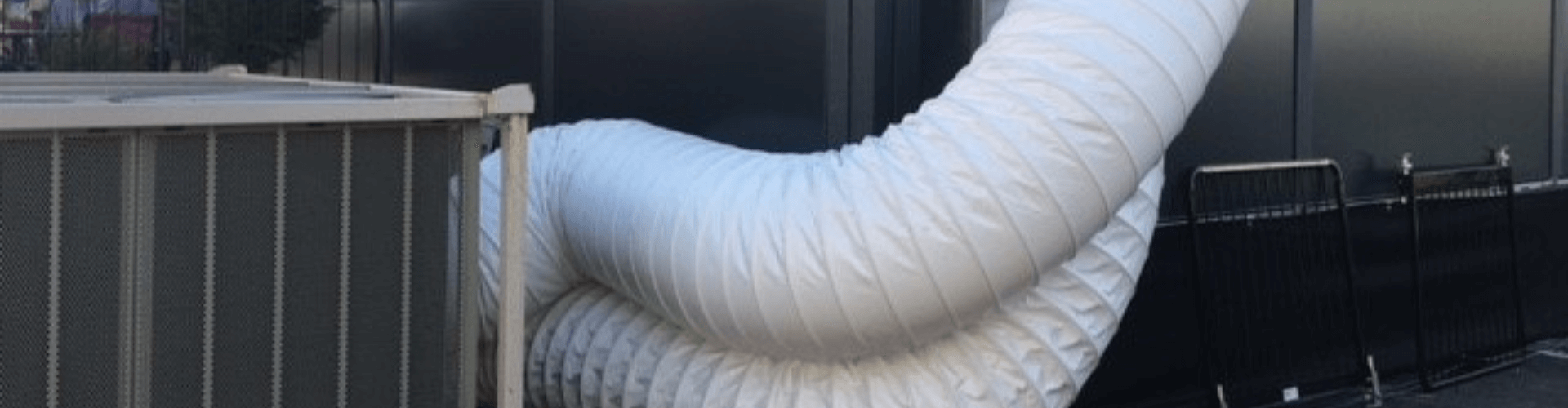 White A/C ventilation hose providing efficient airflow for temporary air conditioning systems.