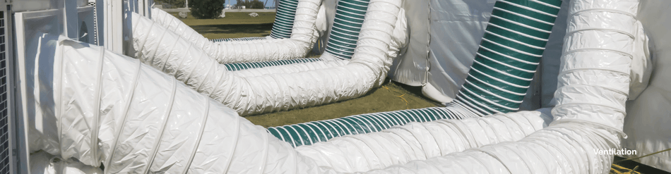 White and green ventilation hoses optimized for airflow in enclosed spaces, showcasing their flexible design and heat tolerance.