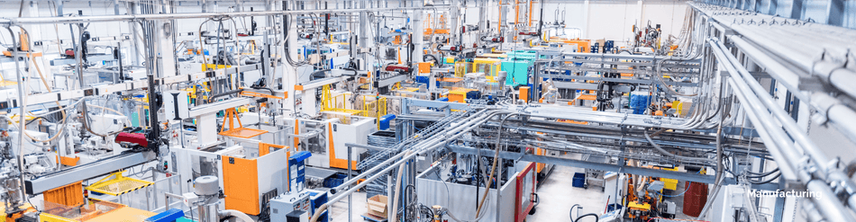 Aerial view of a busy manufacturing facility with machinery and vibrant production lines.