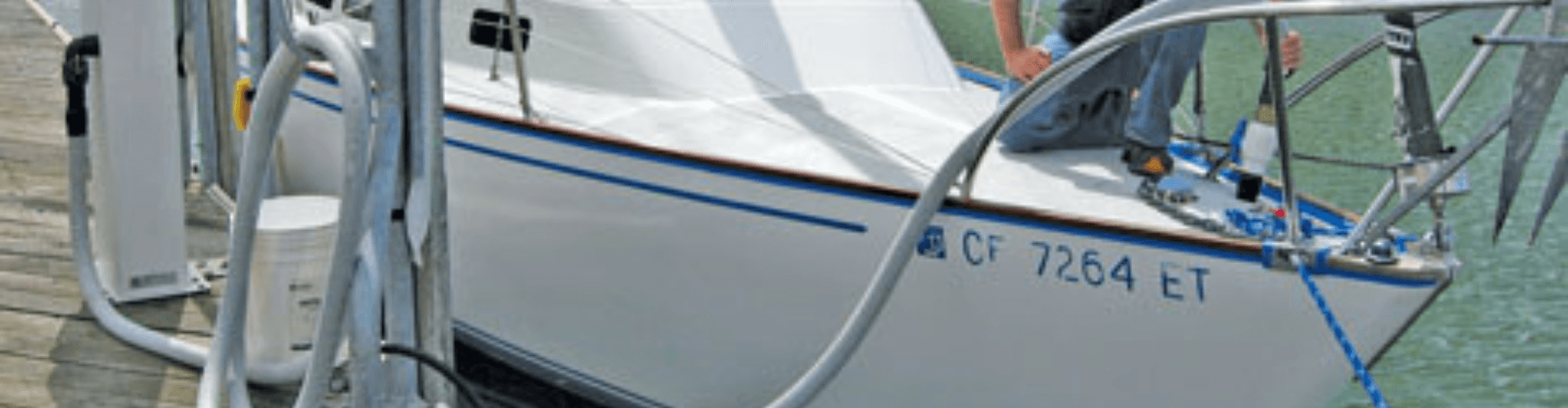 Boat equipped with marine sanitation system for odor control and secure blackwater waste transfer.