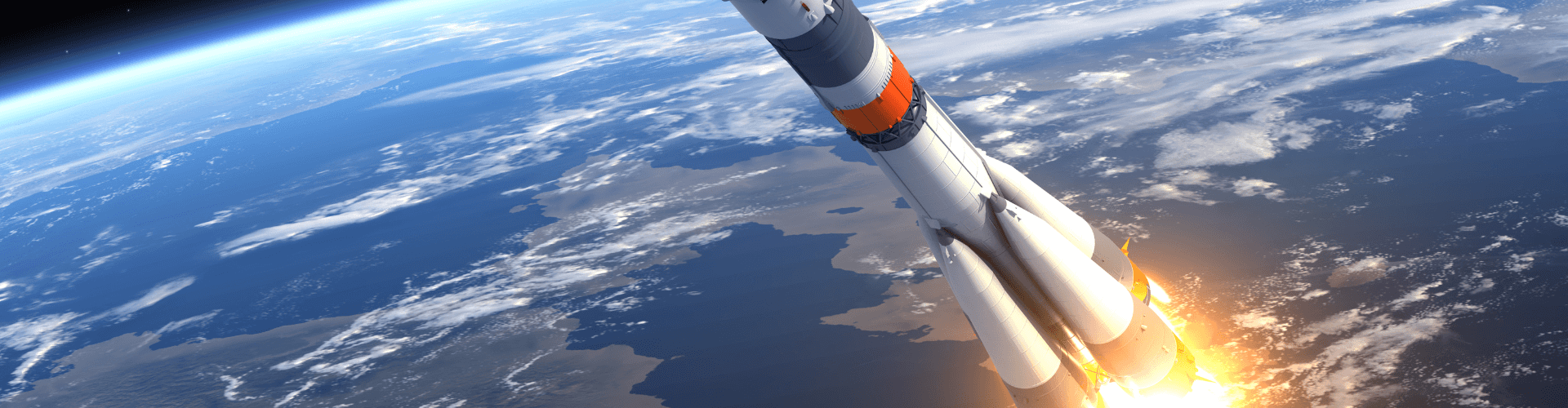 Rocket launching into space, demonstrating aerospace technology and robust support systems for extreme conditions.