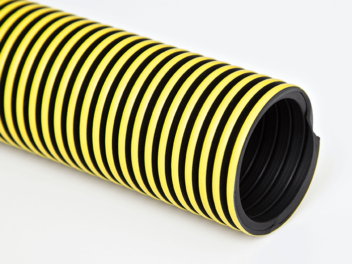 Close-up of a flexible polyethylene hose with black and yellow stripes, suitable for chemical transfer and water lines.