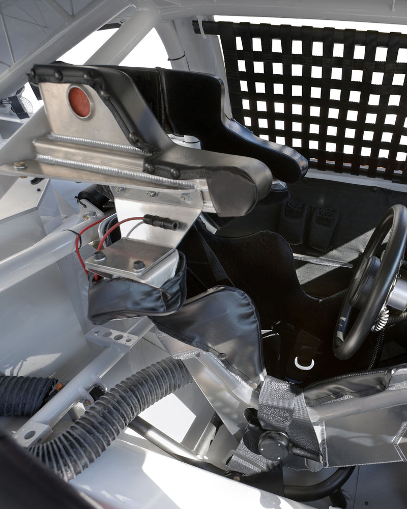 Inside racing car showing ventilation hose