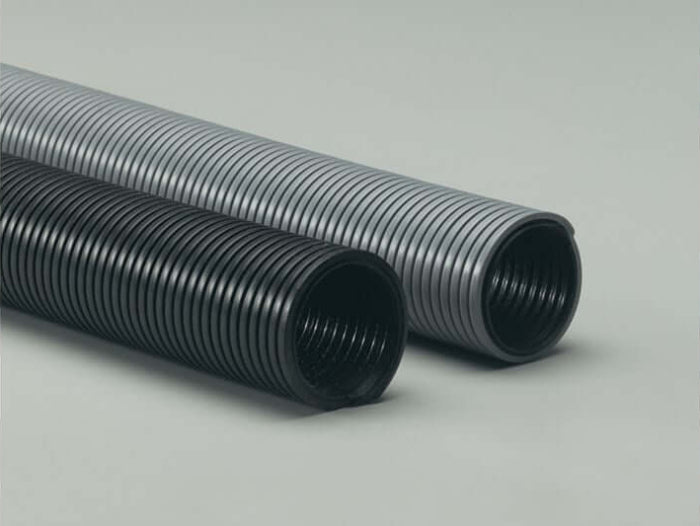Commercial black and gray hoses showcasing their durable, coiled design for various industrial applications.