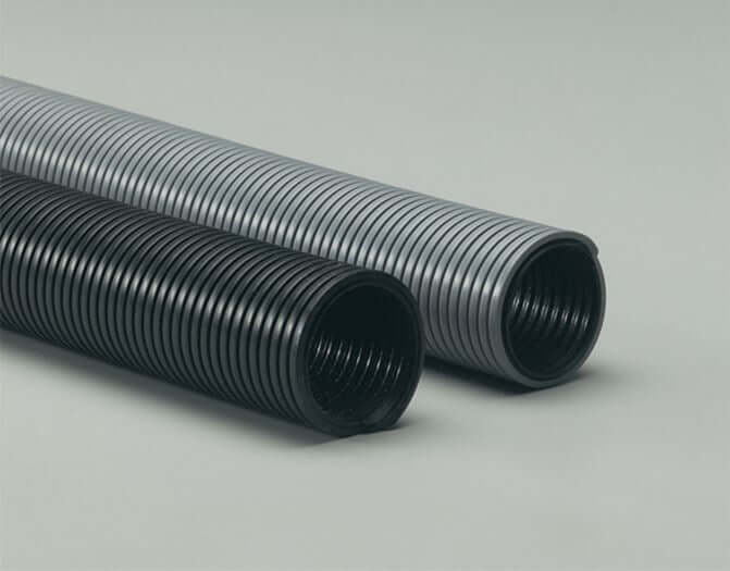 Genesis Commercial Gray Hose and black hose showcasing reinforced design for versatility in various applications.
