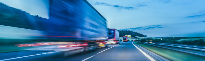 Long exposure of a truck on a highway with motion blur